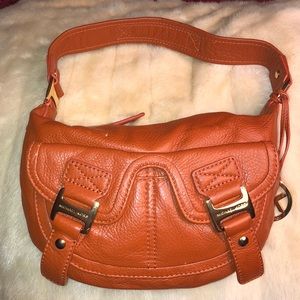 Michael Kors orange hand bag